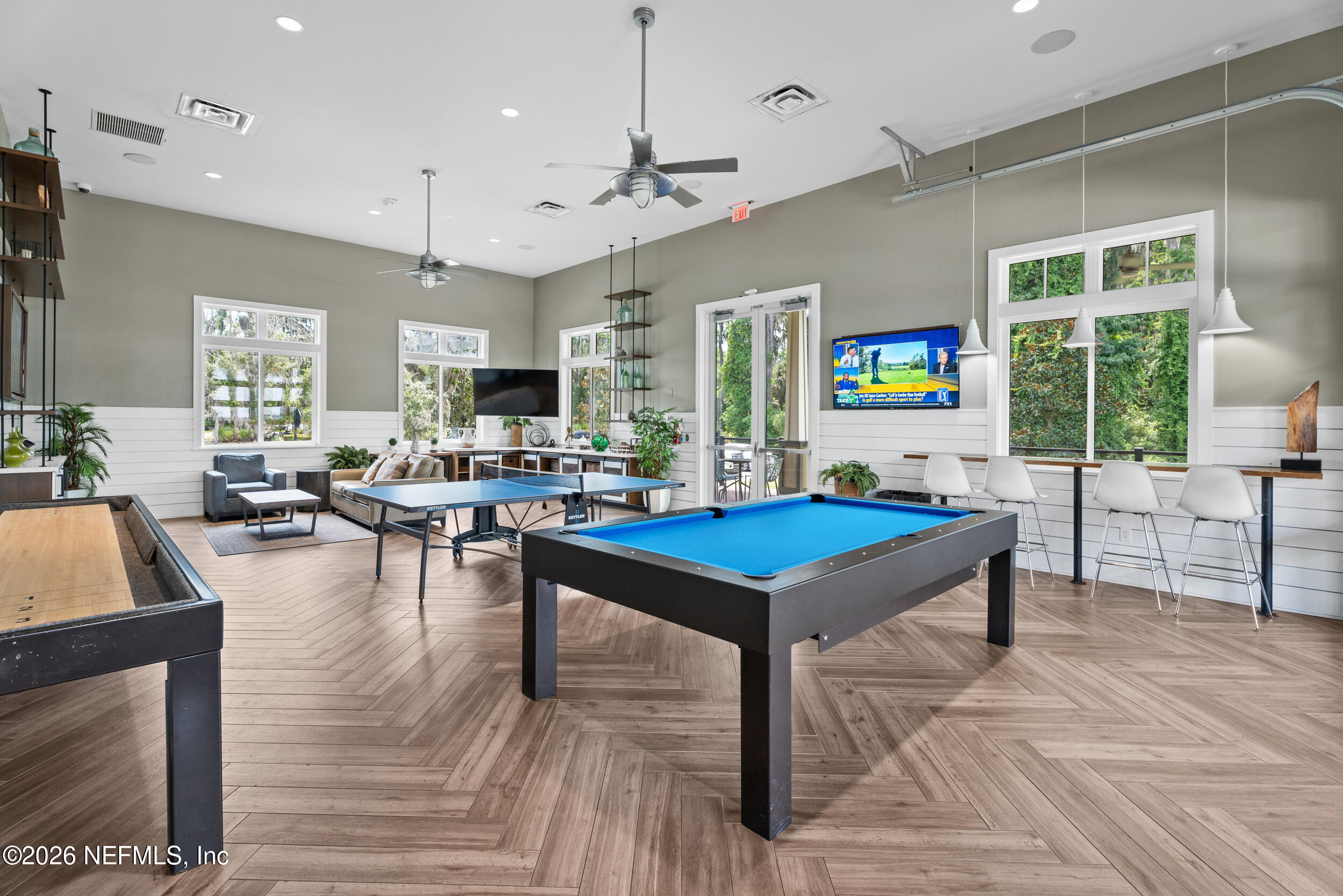 49 Oak Shadow Place St. Johns, FL 32259 - Photo 48 of 48 a living room with furniture a pool table and a flat screen tv