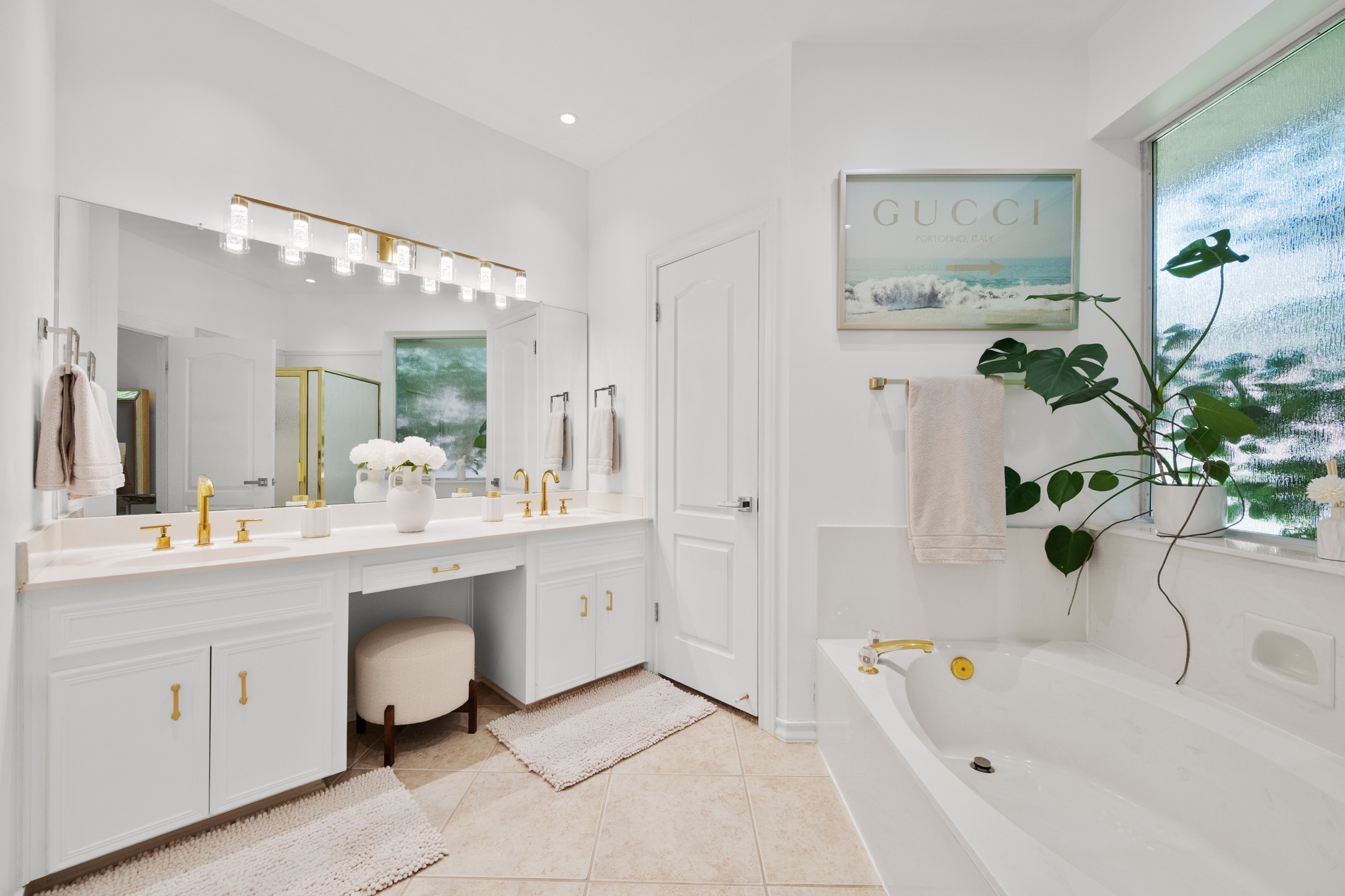 30115 Sawgrass Trail Georgetown, TX 78628 - Photo 12 of 37 Indulge in a tranquil bathing experience with a soaking tub and elegant vanity with dual sinks.