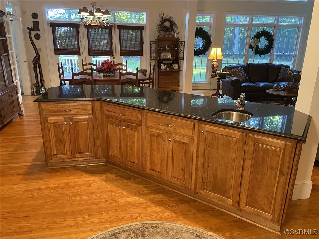 403 Woodruff Drive Aylett, VA 23009 - Photo 14 of 33 Kitchen featuring sink, pendant lighting, dark sto