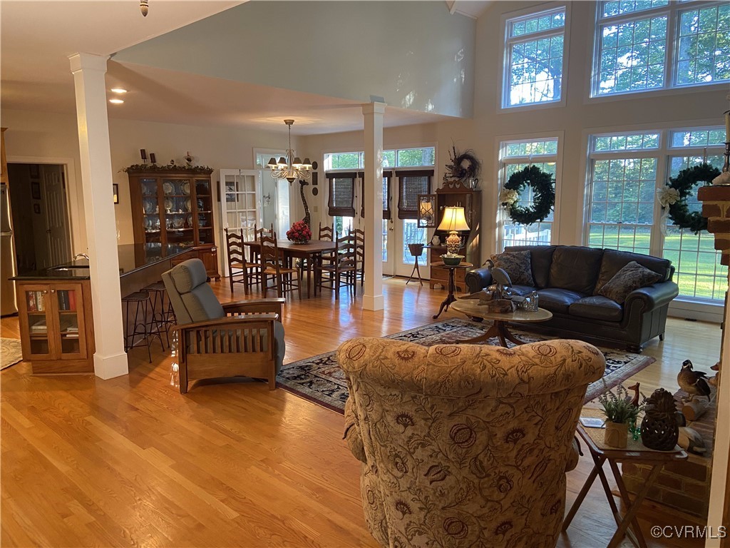 403 Woodruff Drive Aylett, VA 23009 - Photo 16 of 33 Living room featuring an inviting chandelier, deco