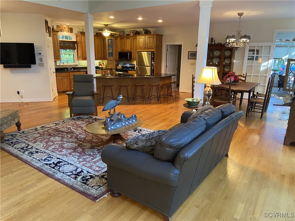 403 Woodruff Drive Aylett, VA 23009 - Photo 21 of 33 Living room with ornate columns, sink, ceiling fan