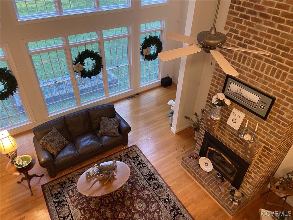 403 Woodruff Drive Aylett, VA 23009 - Photo 25 of 33 Living room with ceiling fan, light wood-type floo