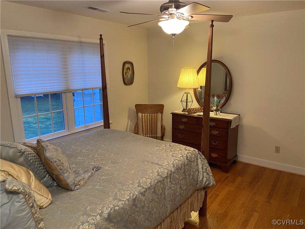 403 Woodruff Drive Aylett, VA 23009 - Photo 26 of 33 Bedroom with light wood-type flooring and ceiling