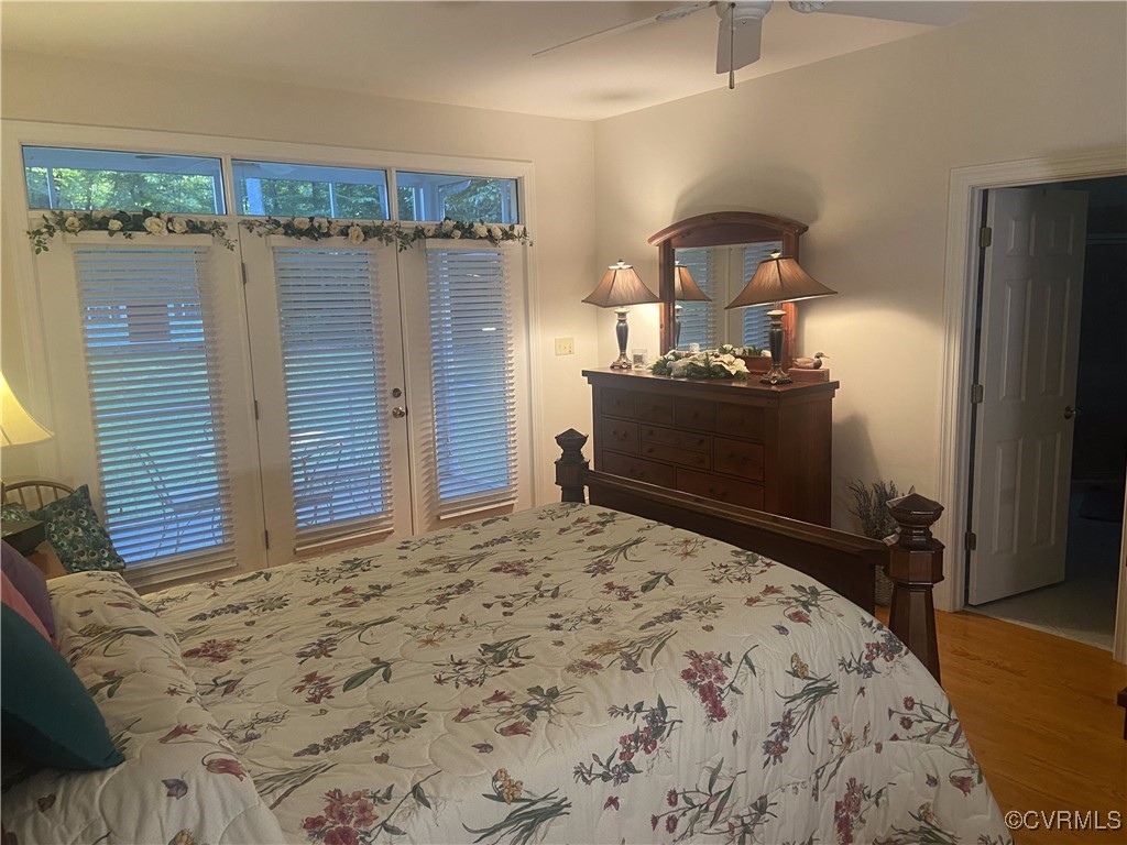 403 Woodruff Drive Aylett, VA 23009 - Photo 27 of 33 Bedroom featuring access to exterior, wood-type fl