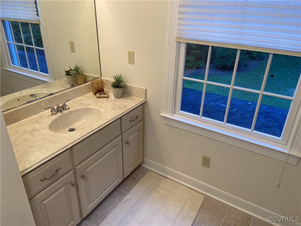 403 Woodruff Drive Aylett, VA 23009 - Photo 28 of 33 Bathroom featuring vanity and tile patterned floor