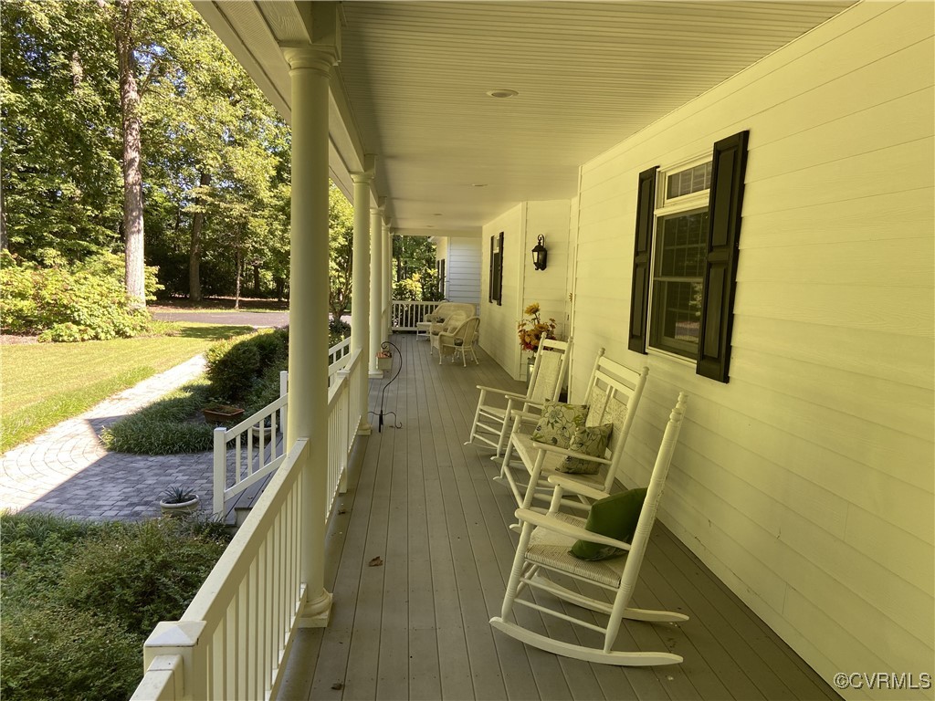 403 Woodruff Drive Aylett, VA 23009 - Photo 7 of 33 Wooden terrace featuring a porch