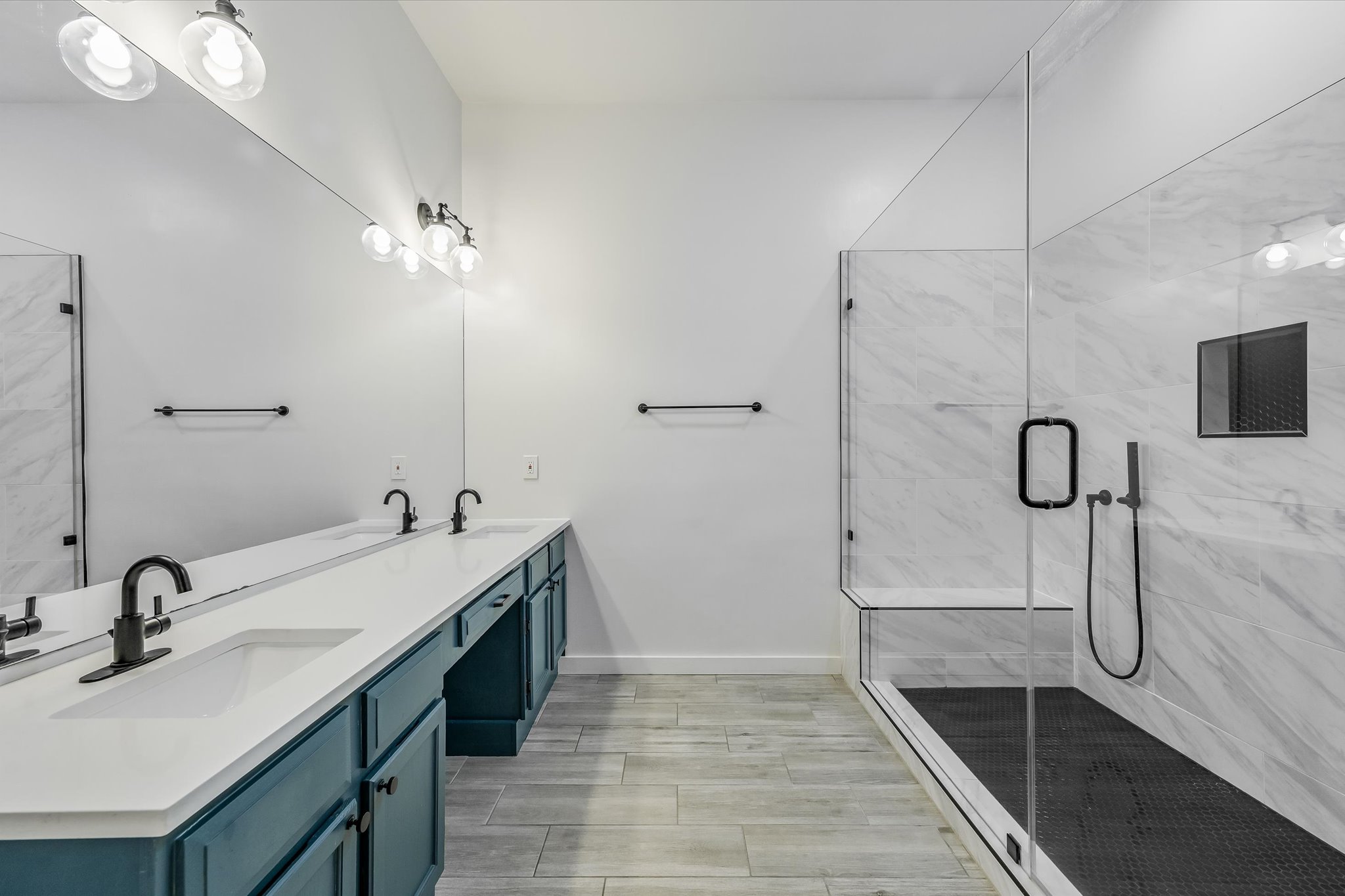 10203 Brantley Bend Austin, TX 78748 - Photo 12 of 20 Full bathroom with a marble finish shower, double vanity, and wood tiled floors