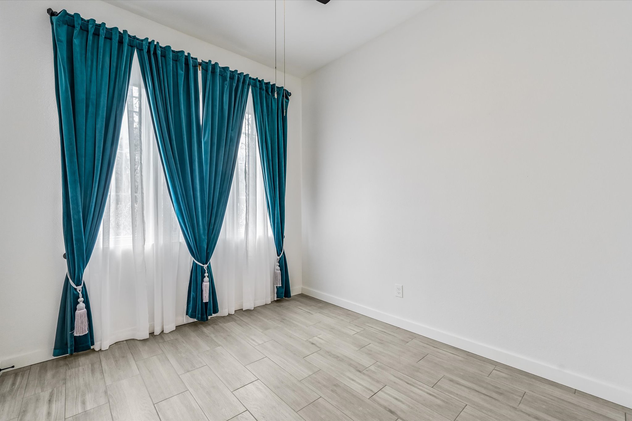 10203 Brantley Bend Austin, TX 78748 - Photo 16 of 20 Empty room featuring wood tiled floors and ceiling fan