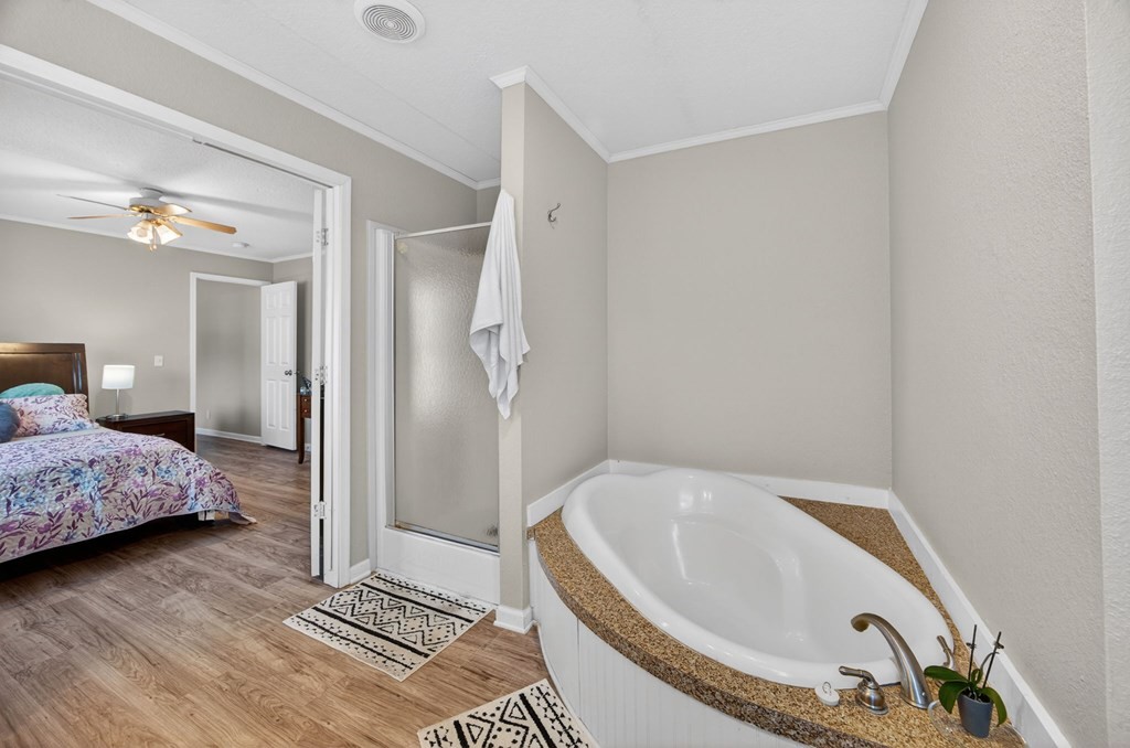 308 Allen's Chapel Road Smithville, TN 37166 - Photo 19 of 26 a spacious bathroom with a tub and shower