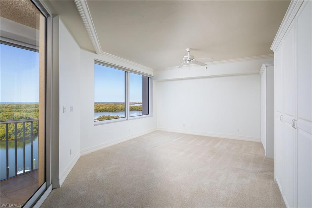 435 Dockside Drive, Unit B703 Naples, FL 34110 - Photo 17 of 38 a view of an empty room with a window