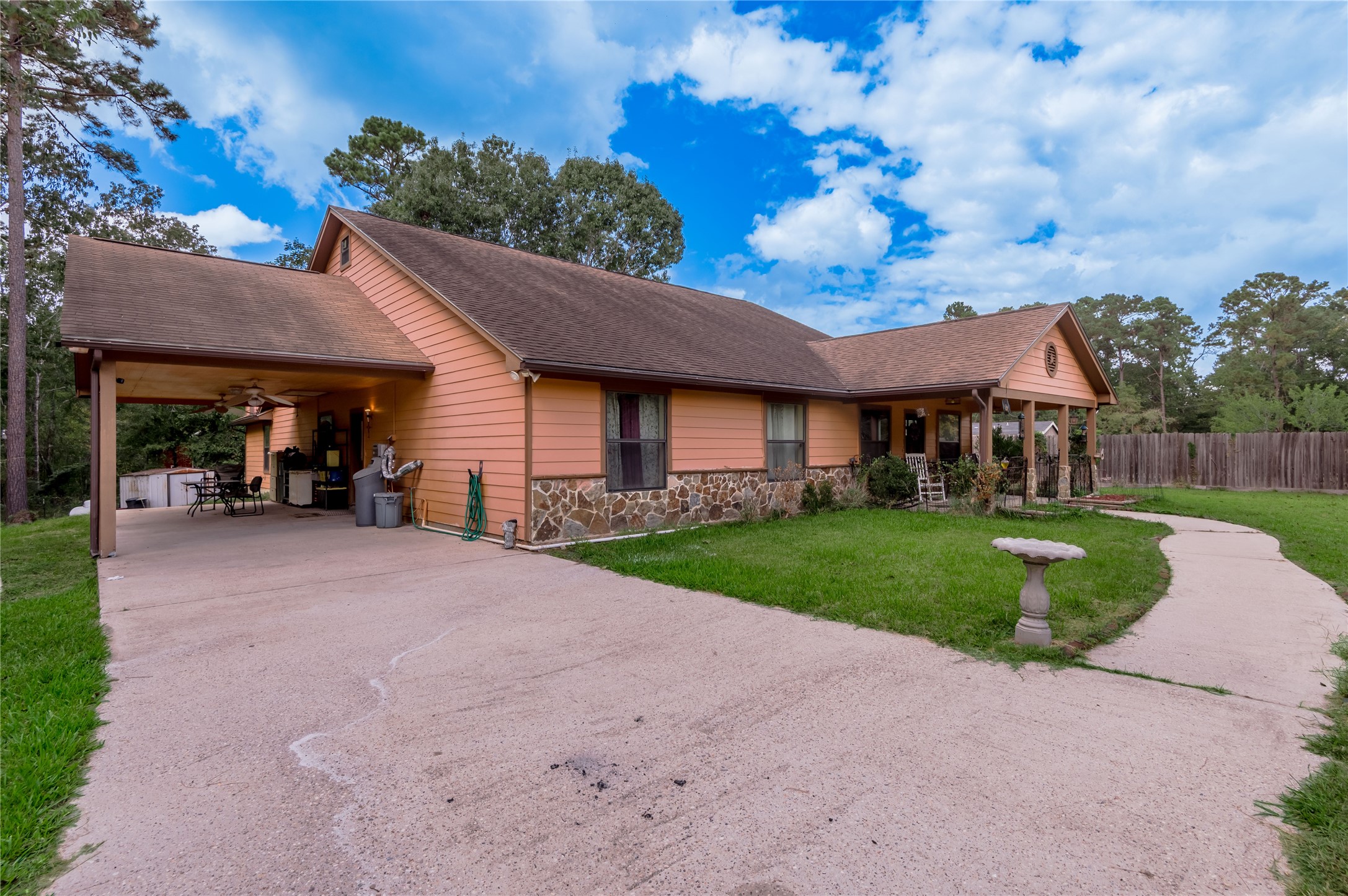 47-57 Stage Coach Road Coldspring, TX 77331 - Photo 27 of 50 a view of a house with backyard and a garden
