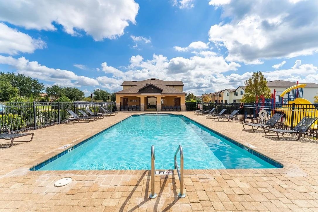 308 Syrah Way St. Augustine, FL 32084 - Photo 17 of 24 a view of a swimming pool with a lounge chairs