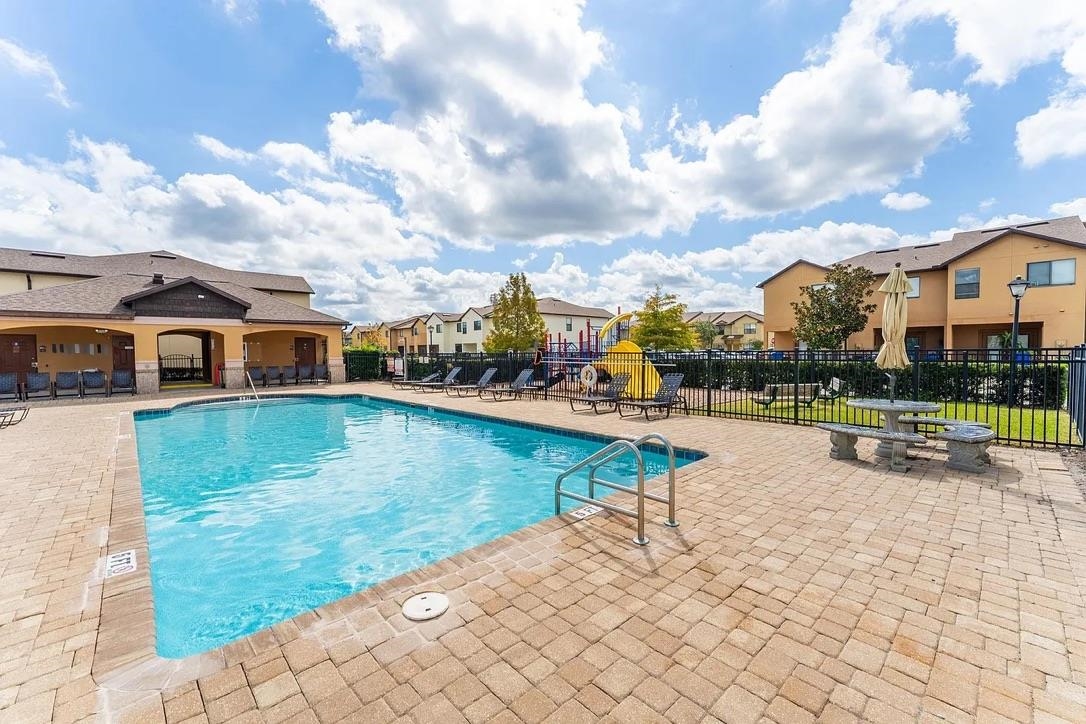 308 Syrah Way St. Augustine, FL 32084 - Photo 18 of 24 a view of a house with swimming pool