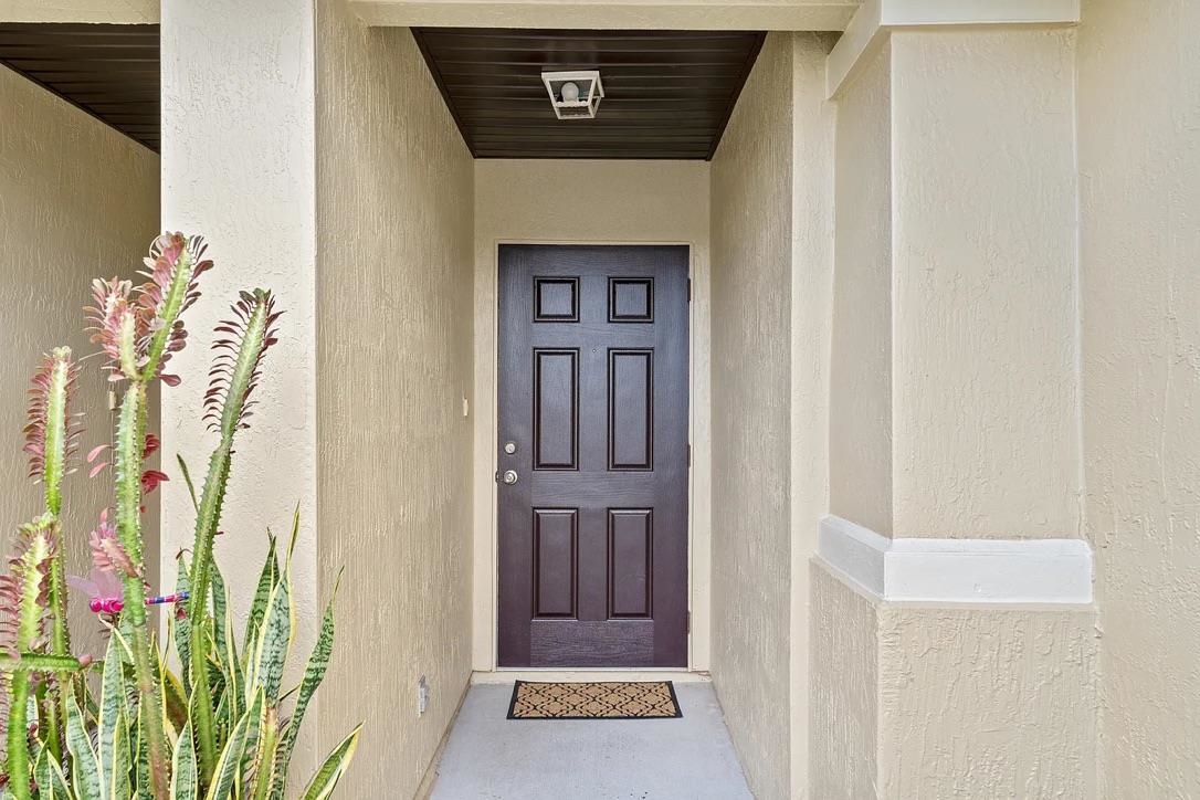 308 Syrah Way St. Augustine, FL 32084 - Photo 4 of 24 a view of front door with hallway