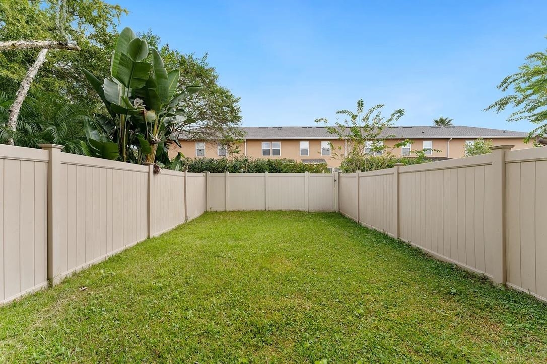 308 Syrah Way St. Augustine, FL 32084 - Photo 8 of 24 a view of a backyard