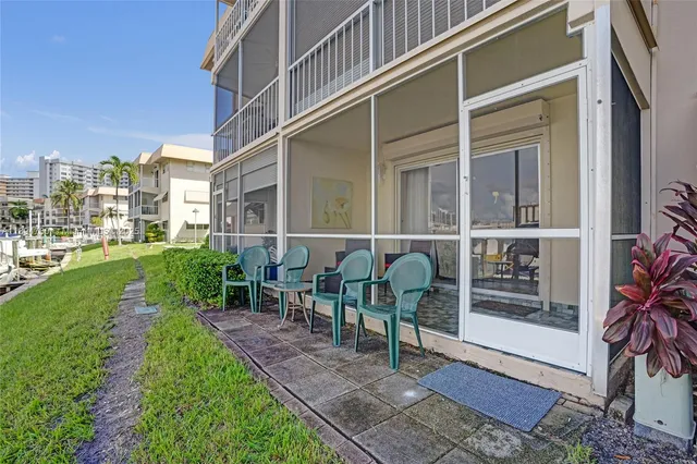 a view of a street with a car parked in front of it