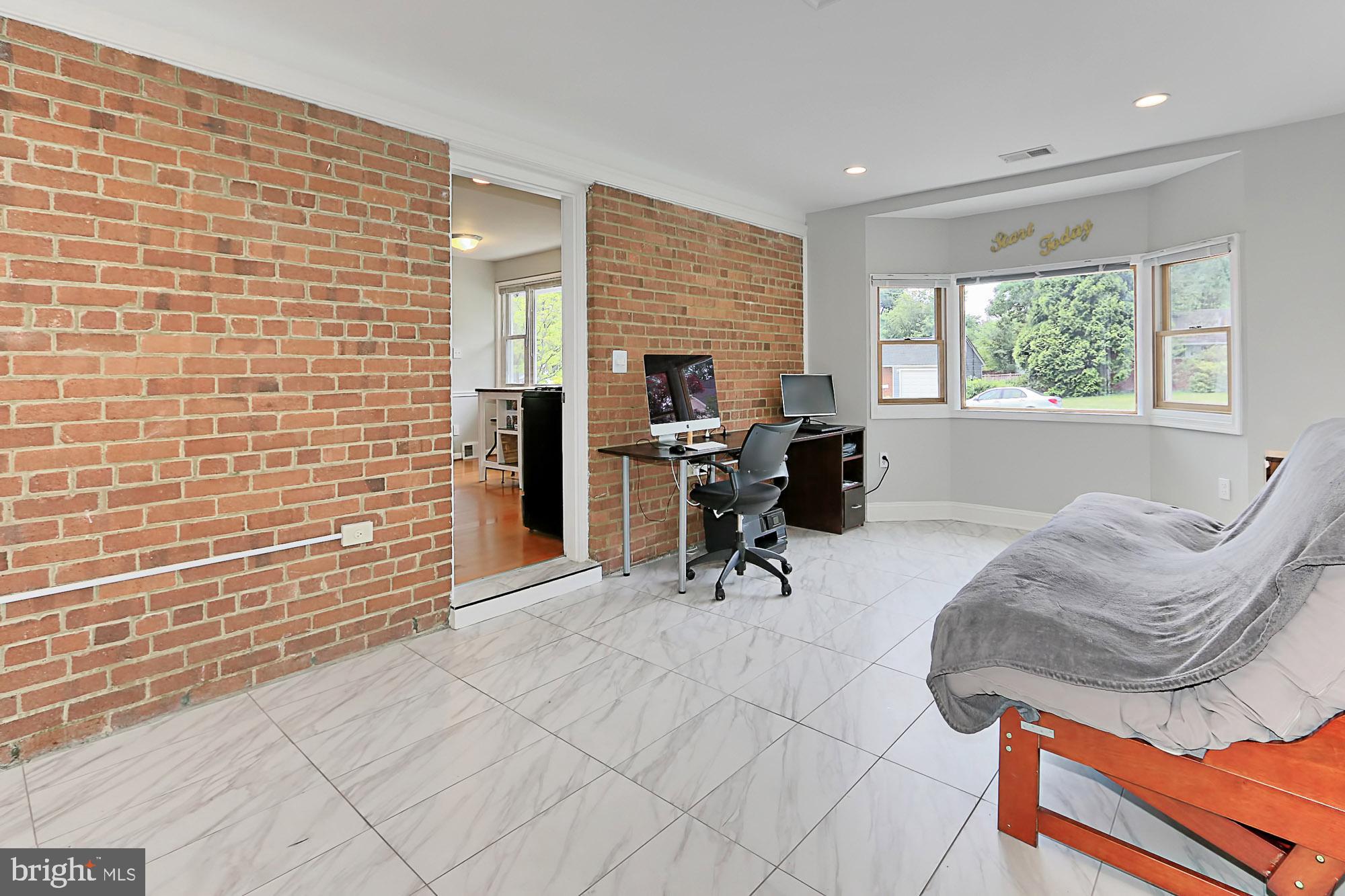 7410 Gresham Street Springfield, VA 22151 - Photo 9 of 28 Beautiful exposed brick wall