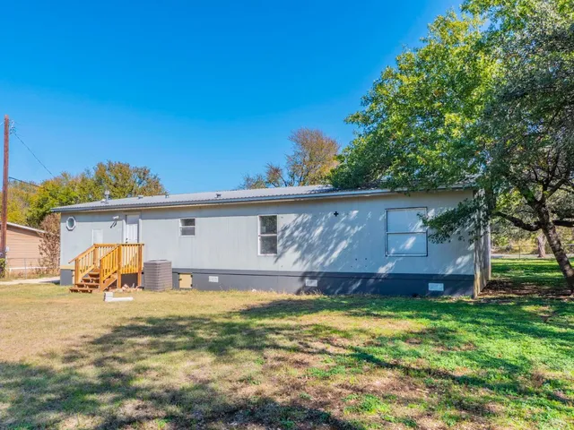 a front view of a house with patio