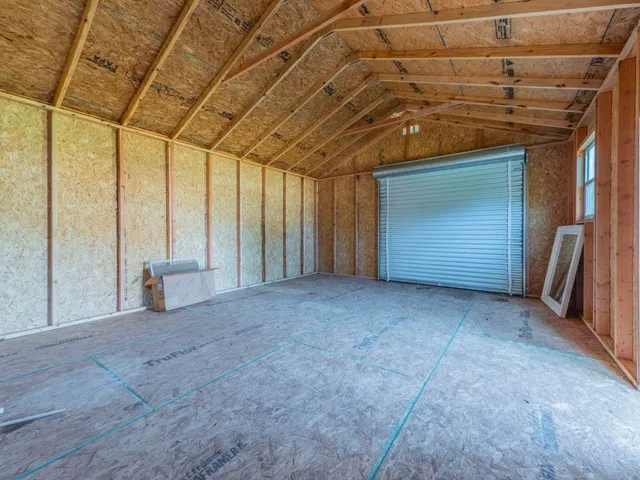 a view of an empty room with a couch