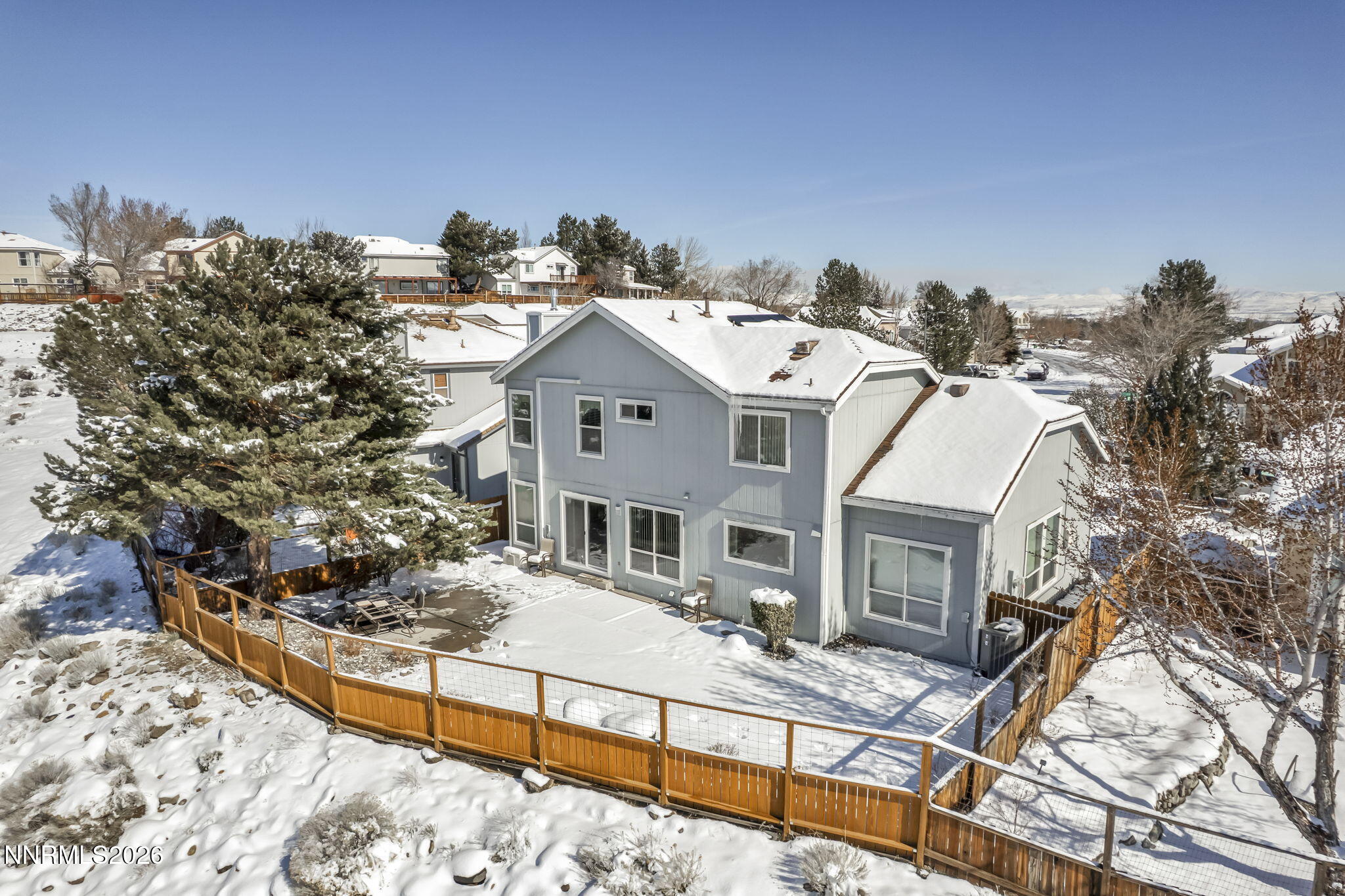 4692 Canyon Ridge Lane Reno, NV 89523 - Photo 15 of 68 a view of a house with wooden fence