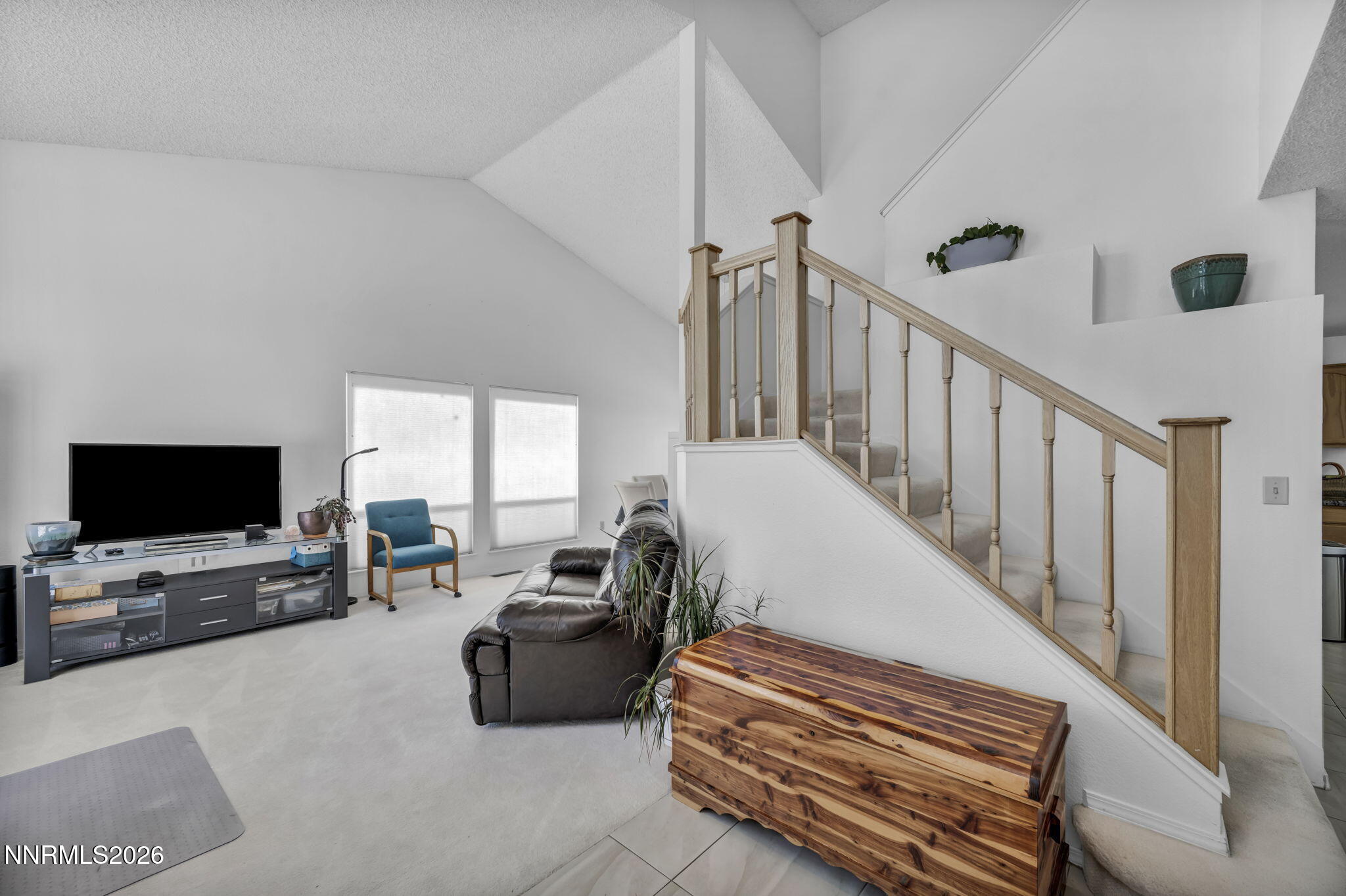 4692 Canyon Ridge Lane Reno, NV 89523 - Photo 30 of 68 a living room with furniture and a flat screen tv