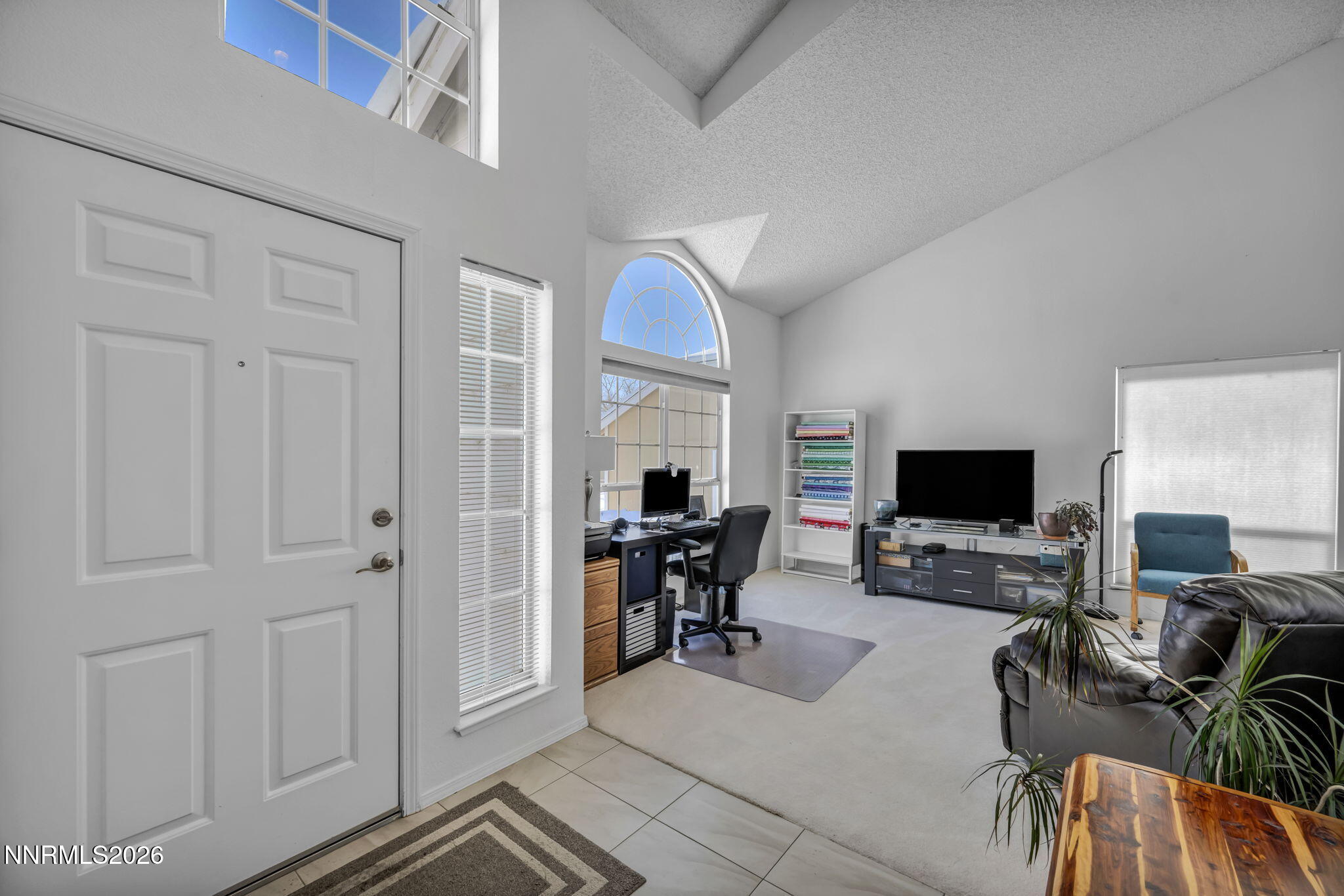 4692 Canyon Ridge Lane Reno, NV 89523 - Photo 32 of 68 a view of a livingroom with furniture and a flat screen tv