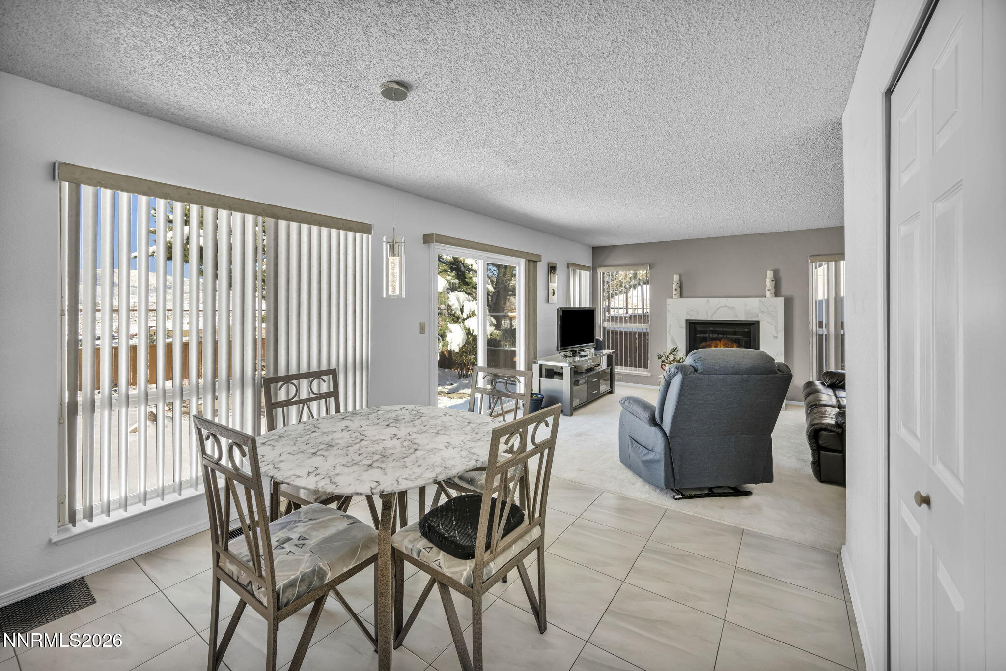 4692 Canyon Ridge Lane Reno, NV 89523 - Photo 45 of 68 a view of a dining room with furniture window and outside view