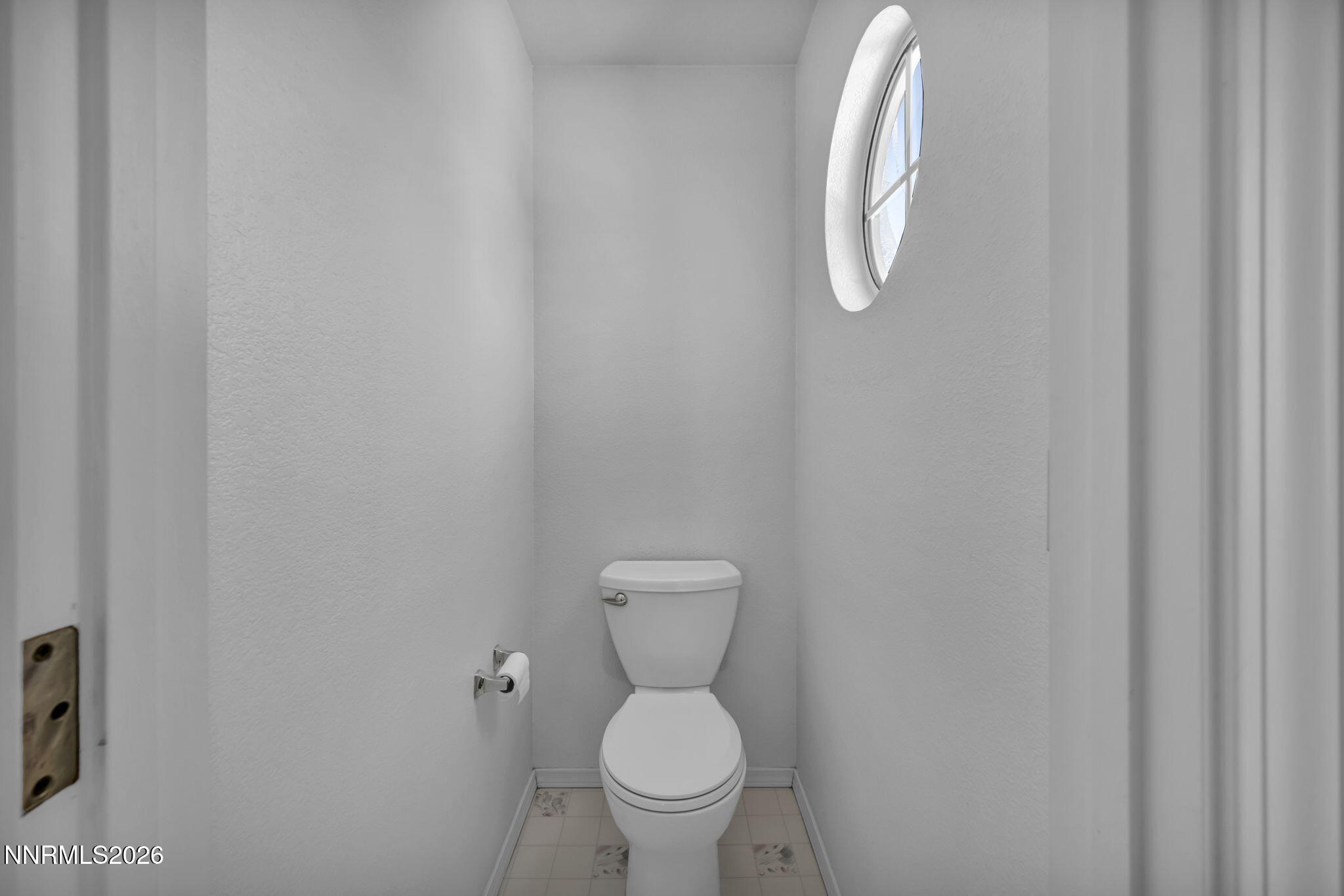 4692 Canyon Ridge Lane Reno, NV 89523 - Photo 58 of 68 a white toilet sitting next to a shower