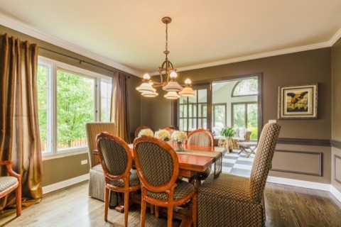 737 West Bauer Road Naperville, IL 60563 - Photo 11 of 25 a dining room with furniture a chandelier and wooden floor