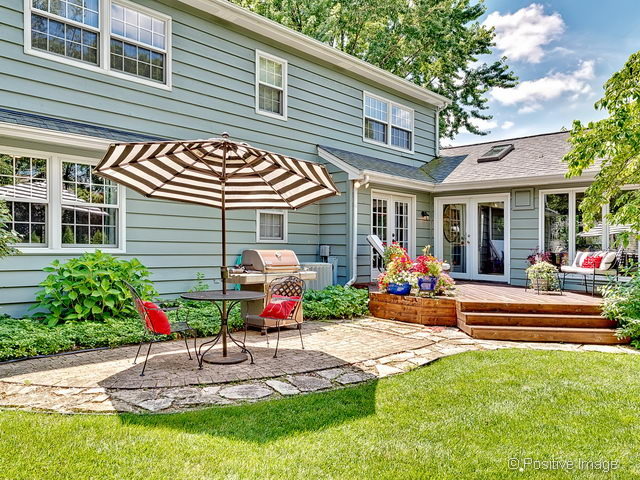 737 West Bauer Road Naperville, IL 60563 - Photo 24 of 25 a view of a house with sitting area and garden