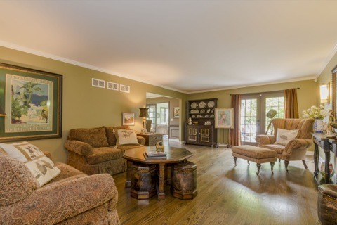 737 West Bauer Road Naperville, IL 60563 - Photo 5 of 25 a living room with furniture and a large window