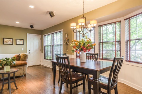 737 West Bauer Road Naperville, IL 60563 - Photo 7 of 25 a dining room with furniture window and wooden floor