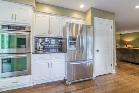 737 West Bauer Road Naperville, IL 60563 - Photo 9 of 25 a kitchen with stainless steel appliances granite countertop a refrigerator and a stove top oven
