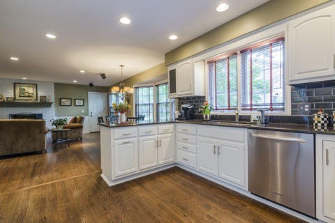 737 West Bauer Road Naperville, IL 60563 - Photo 10 of 25 a kitchen with stainless steel appliances granite countertop a stove a sink and a refrigerator