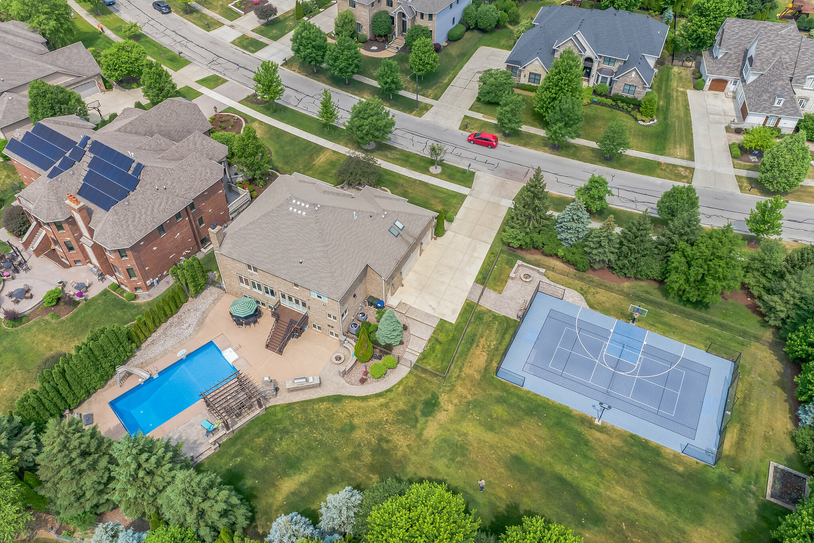 4523 Corktree Road Naperville, IL 60564 - Photo 2 of 2 an aerial view of a house with a yard and garden