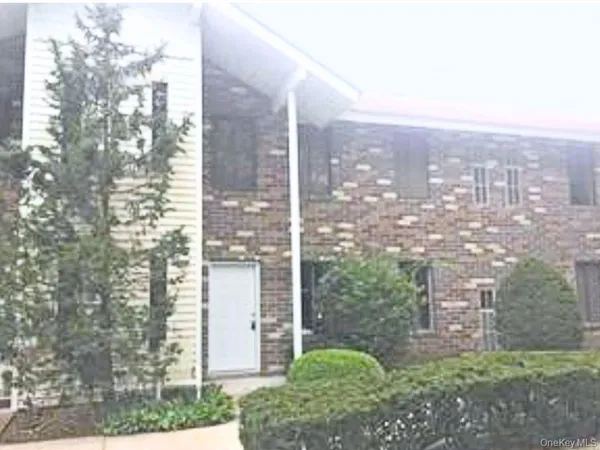 a view of a city with tall buildings