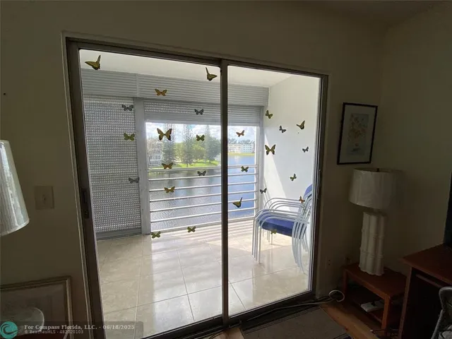 a view of a swimming pool with a garden