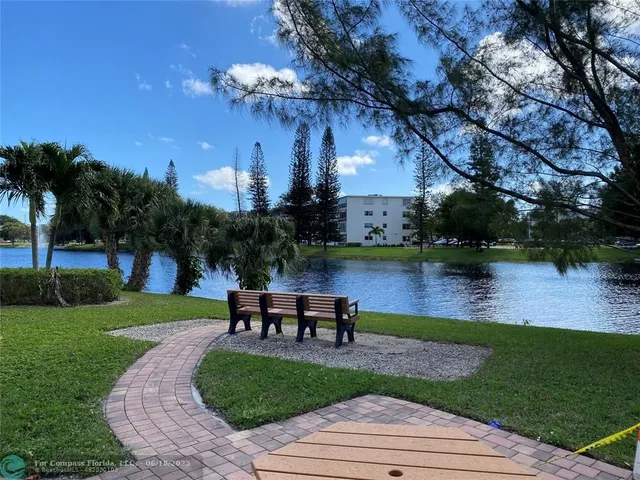 a view of a park with welcome board