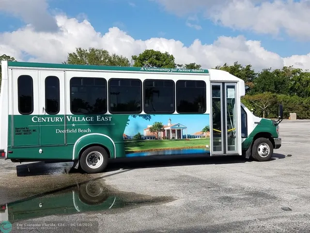 a view of a big house with a big yard