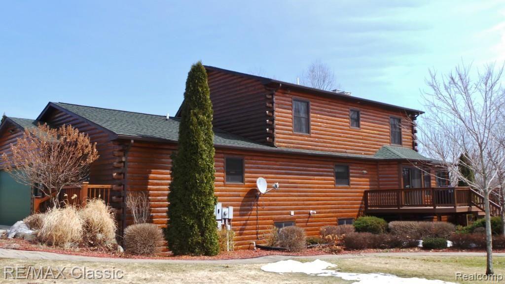 2447 North Hacker Road Howell, MI 48855 - Photo 50 of 62 Rear views