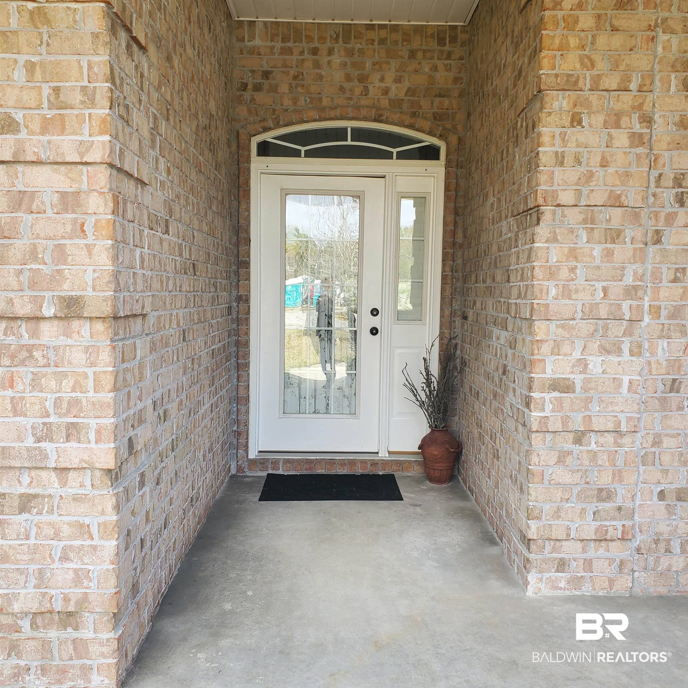 7350 Raintree Lane Gulf Shores, AL 36542 - Photo 4 of 22 Covered Front Door