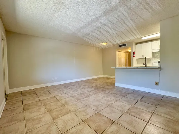 a view of a kitchen with kitchen