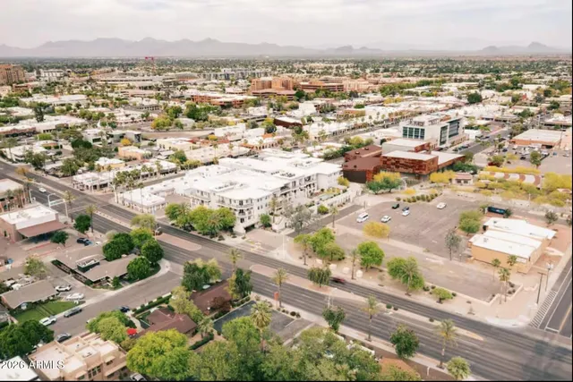 an aerial view of a city with lots of residential buildings