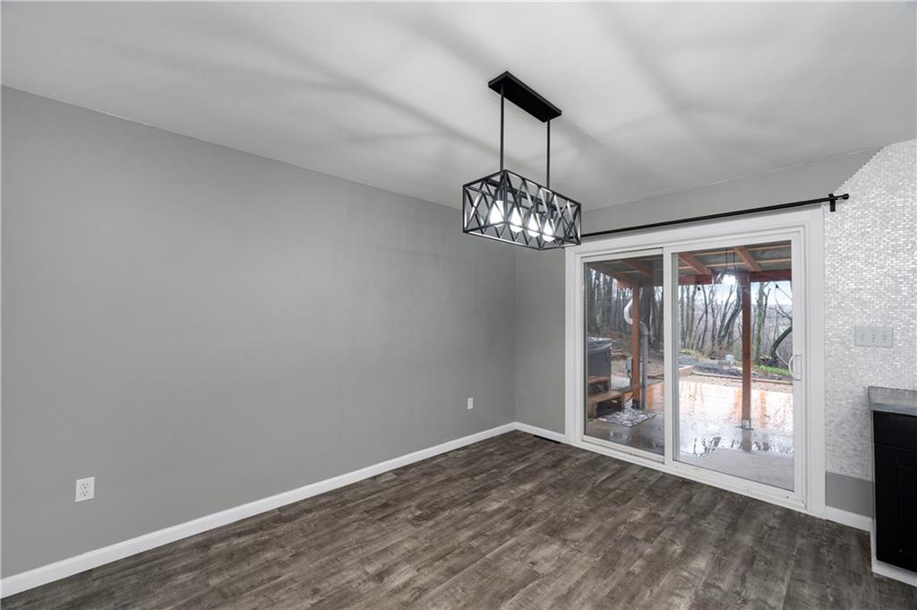 241 La Ray Drive Butler, PA 16001 - Photo 11 of 34 a view of an empty room with wooden floor and a window