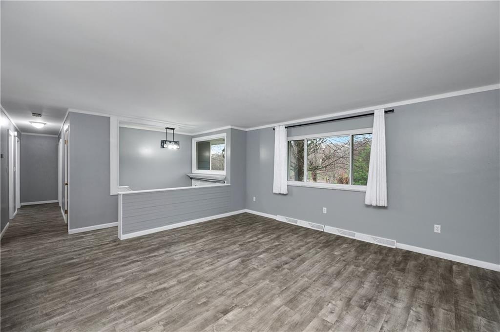 241 La Ray Drive Butler, PA 16001 - Photo 13 of 34 an empty room with wooden floor and windows