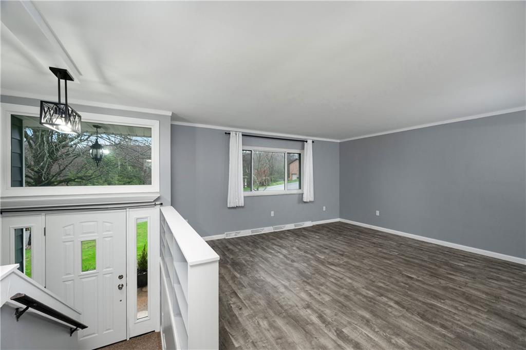 241 La Ray Drive Butler, PA 16001 - Photo 14 of 34 an empty room with wooden floor and windows