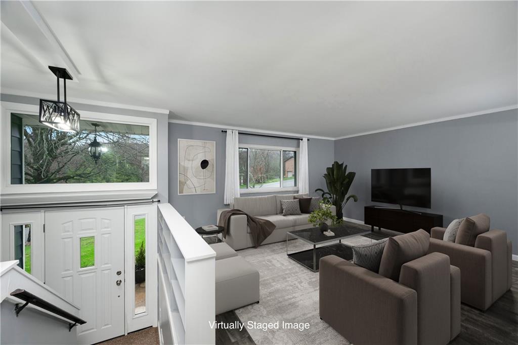 241 La Ray Drive Butler, PA 16001 - Photo 15 of 34 a living room with furniture and a flat screen tv