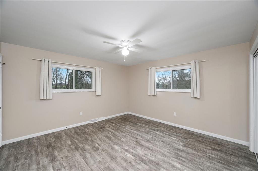 241 La Ray Drive Butler, PA 16001 - Photo 17 of 34 a view of empty room with wooden floor and ceiling fan