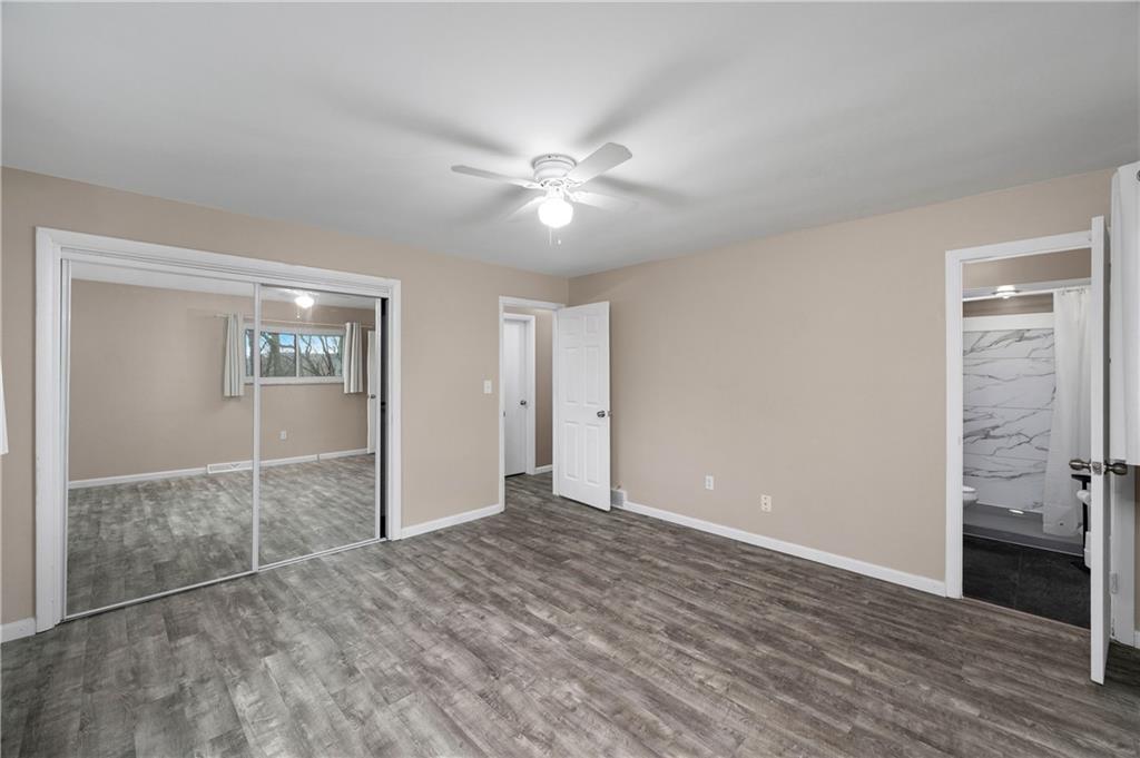 241 La Ray Drive Butler, PA 16001 - Photo 19 of 34 a view of empty room with wooden floor and a ceiling fan