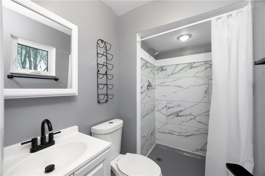 241 La Ray Drive Butler, PA 16001 - Photo 20 of 34 a bathroom with a toilet sink and shower